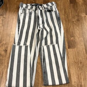 grey and white skinny jeans